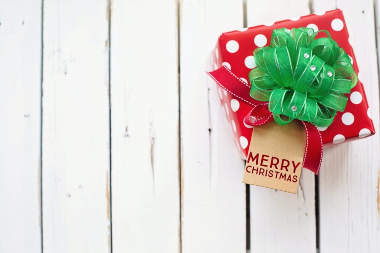 minimalist photography of a red and green christmas gift box